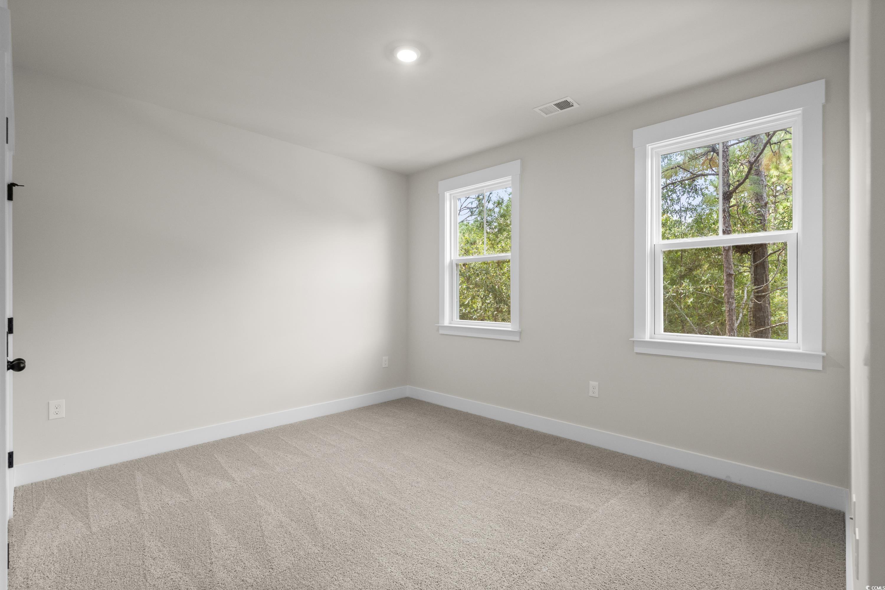 82 Bridge View Road Georgetown, SC 29440 - Photo 21 of 32 Unfurnished room with baseboards and light colored carpet