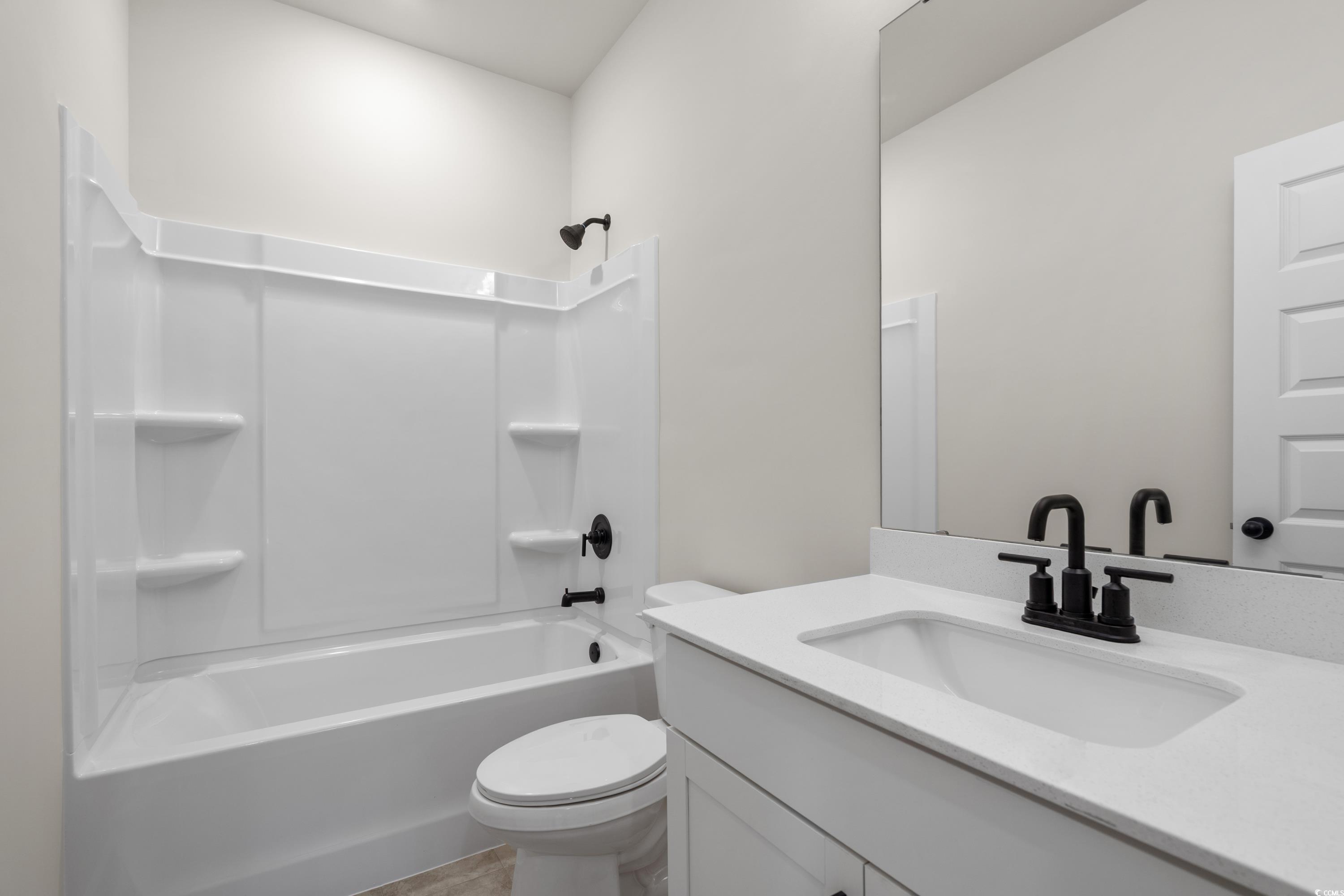 82 Bridge View Road Georgetown, SC 29440 - Photo 24 of 32 Bathroom featuring shower / bathtub combination and vanity