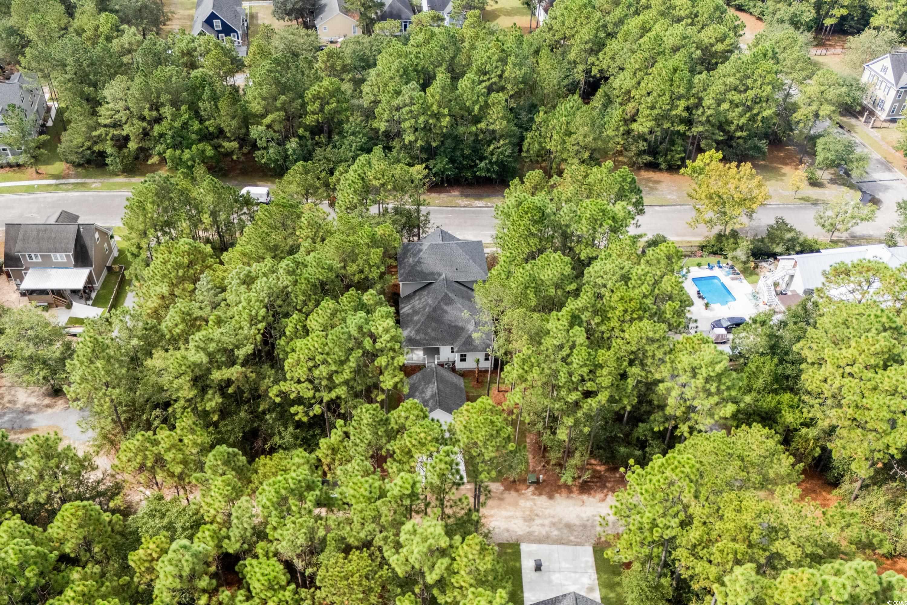 82 Bridge View Road Georgetown, SC 29440 - Photo 30 of 32 Aerial view of property and surrounding area with nearby suburban area