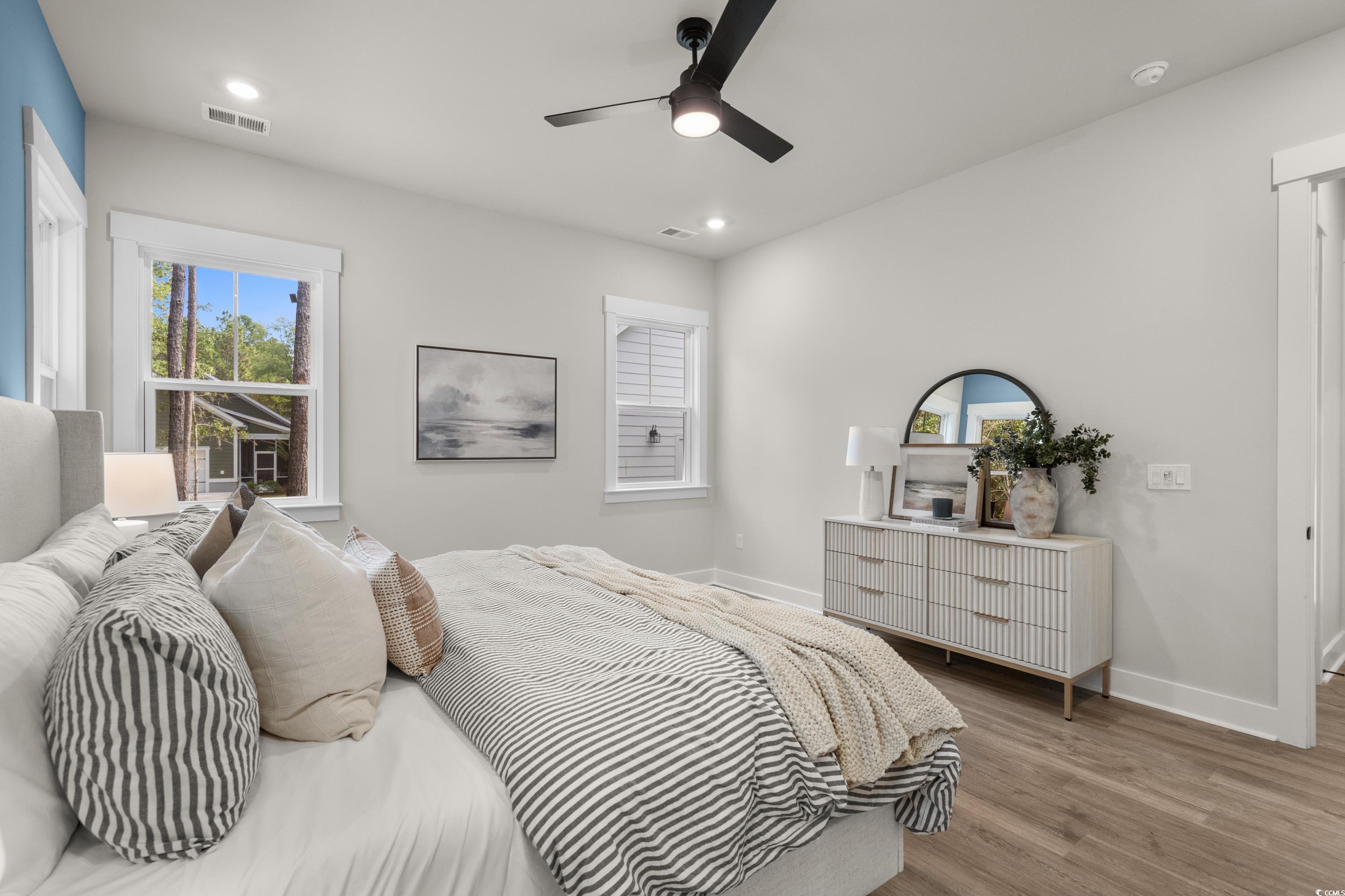 82 Bridge View Road Georgetown, SC 29440 - Photo 31 of 32 Bedroom featuring wood finished floors, recessed lighting, and a ceiling fan