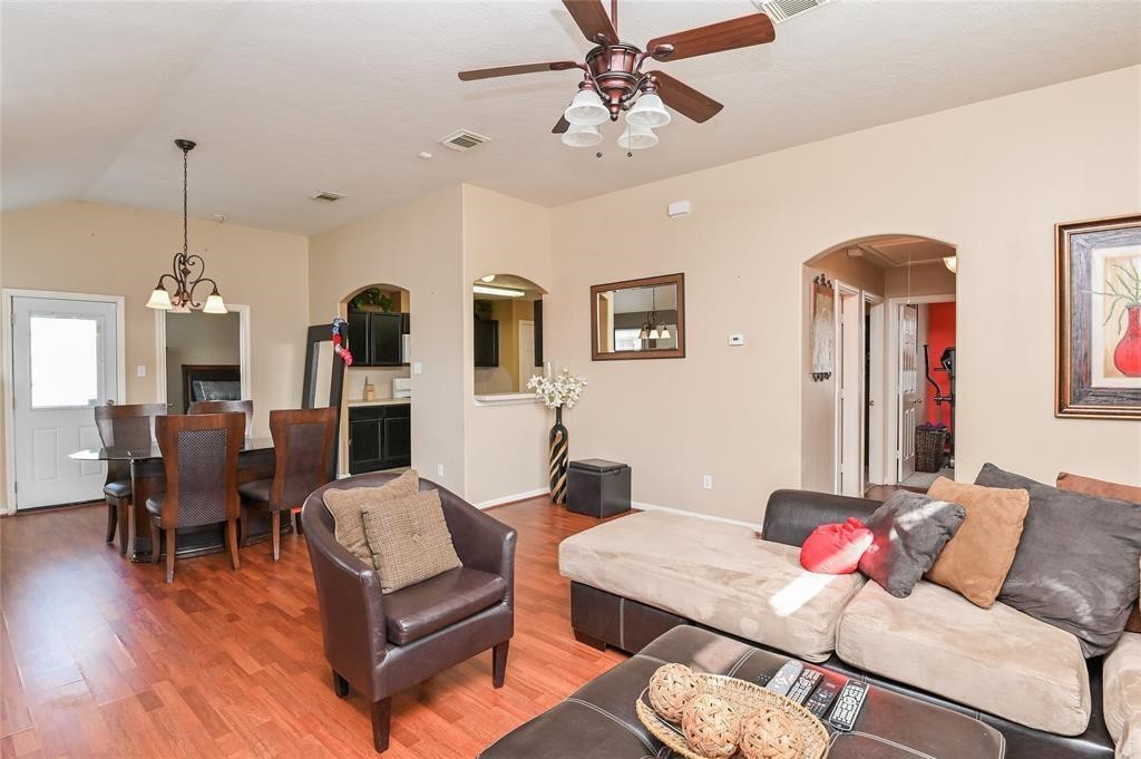 18446 South Wimbledon Drive Katy, TX 77449 - Photo 13 of 24 a living room with furniture and wooden floor