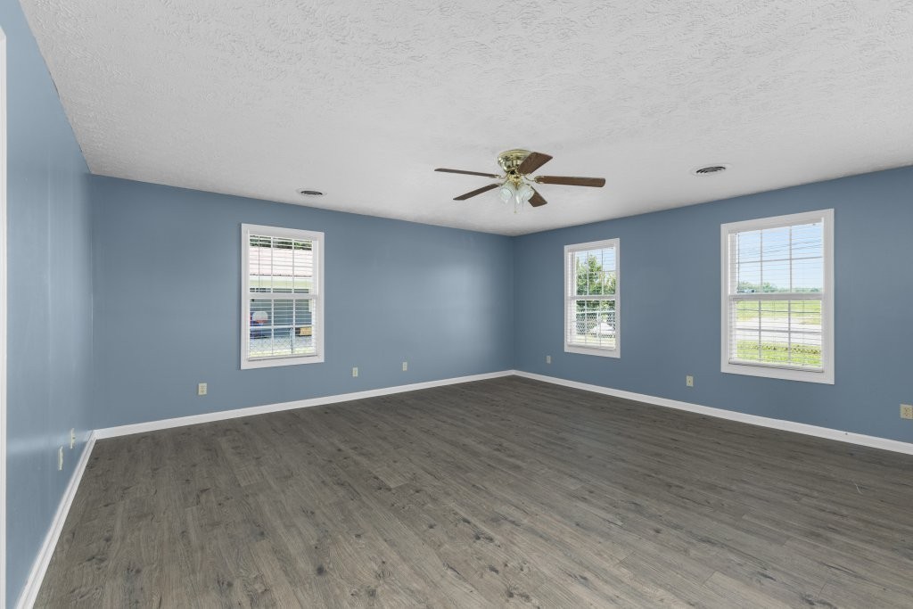 431 South Fair Street Morrison, TN 37357 - Photo 16 of 18 wooden floor in an empty room with a window