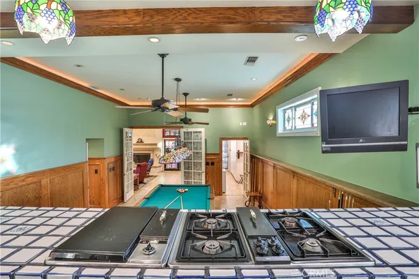 a view of a kitchen with a sink and dishwasher