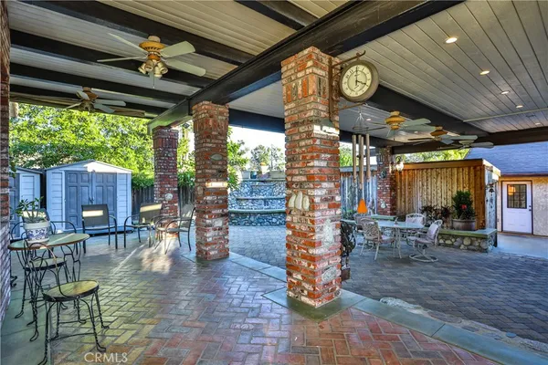 a view of a chairs and table in a patio