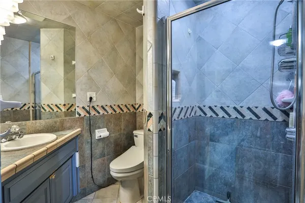 a bathroom with a sink and toilet
