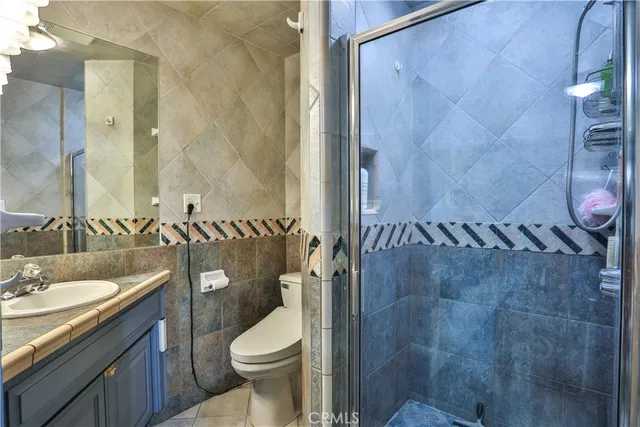 a bathroom with a sink and toilet