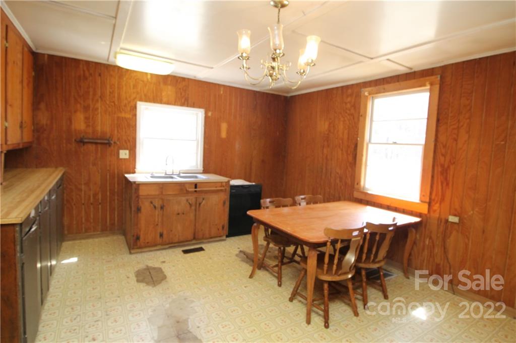 1931 Dan Sexton Road York, SC 29745 - Photo 9 of 22 a room with a table chairs and a chandelier