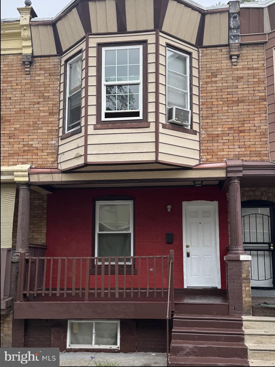 a front view of a house with balcony