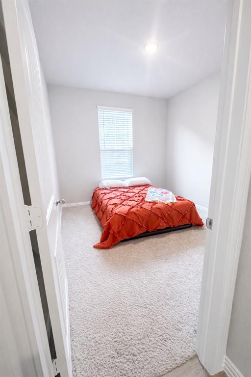 15044 Ted Trail Aledo, TX 76008 - Photo 20 of 37 a bedroom with a bed and a window