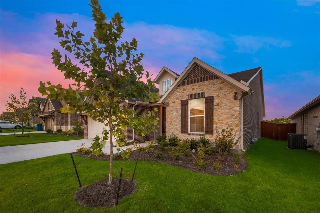15044 Ted Trail Aledo, TX 76008 - Photo 2 of 37 a front view of a house with garden