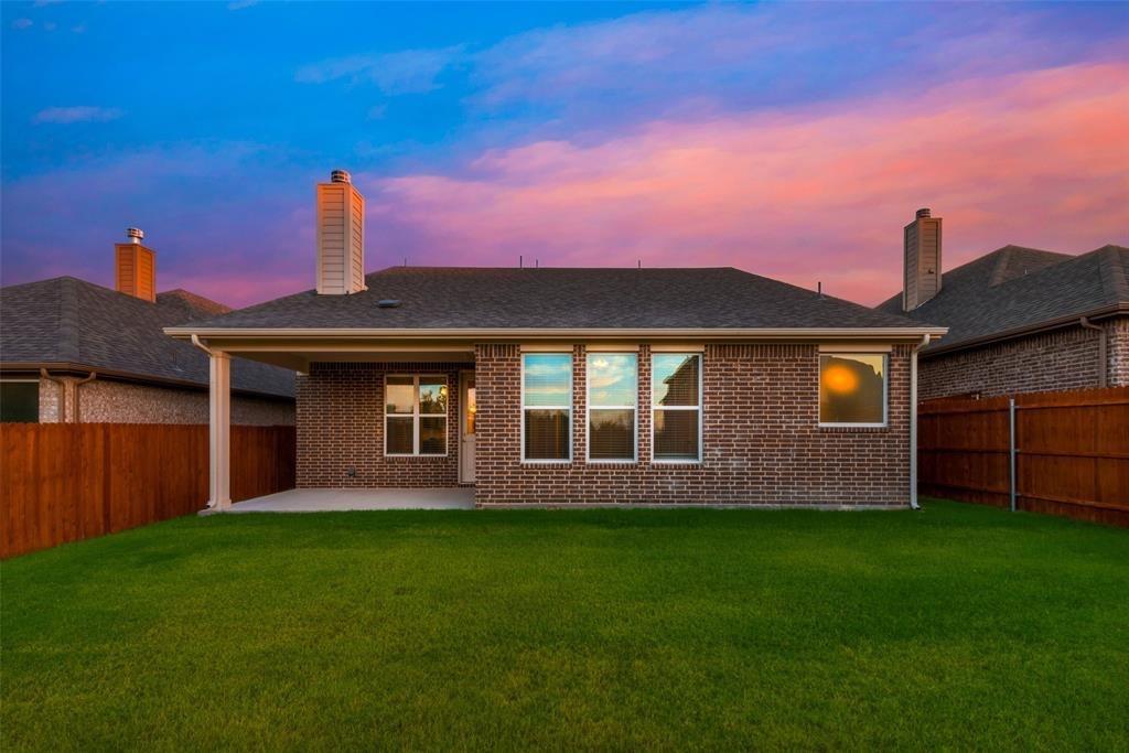15044 Ted Trail Aledo, TX 76008 - Photo 33 of 37 a front view of a house with garden