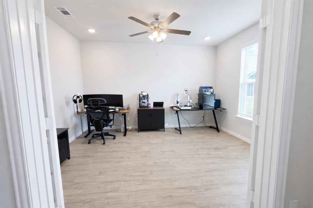 15044 Ted Trail Aledo, TX 76008 - Photo 5 of 37 a view of workspace with furniture and a window