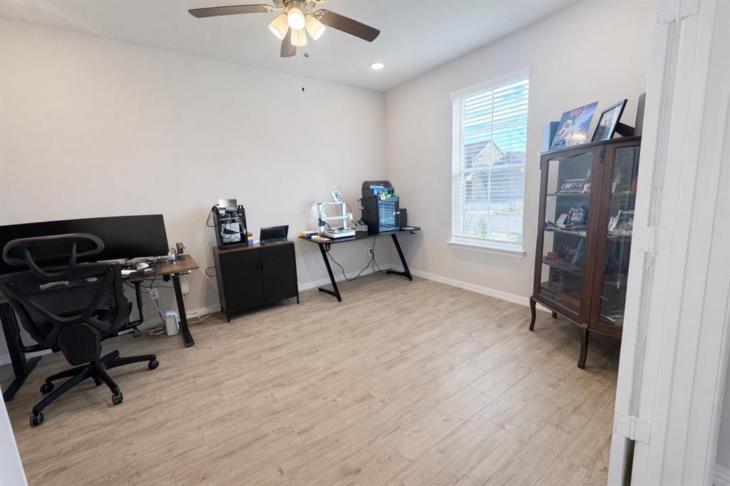 15044 Ted Trail Aledo, TX 76008 - Photo 6 of 37 a view of a workspace with furniture and a window