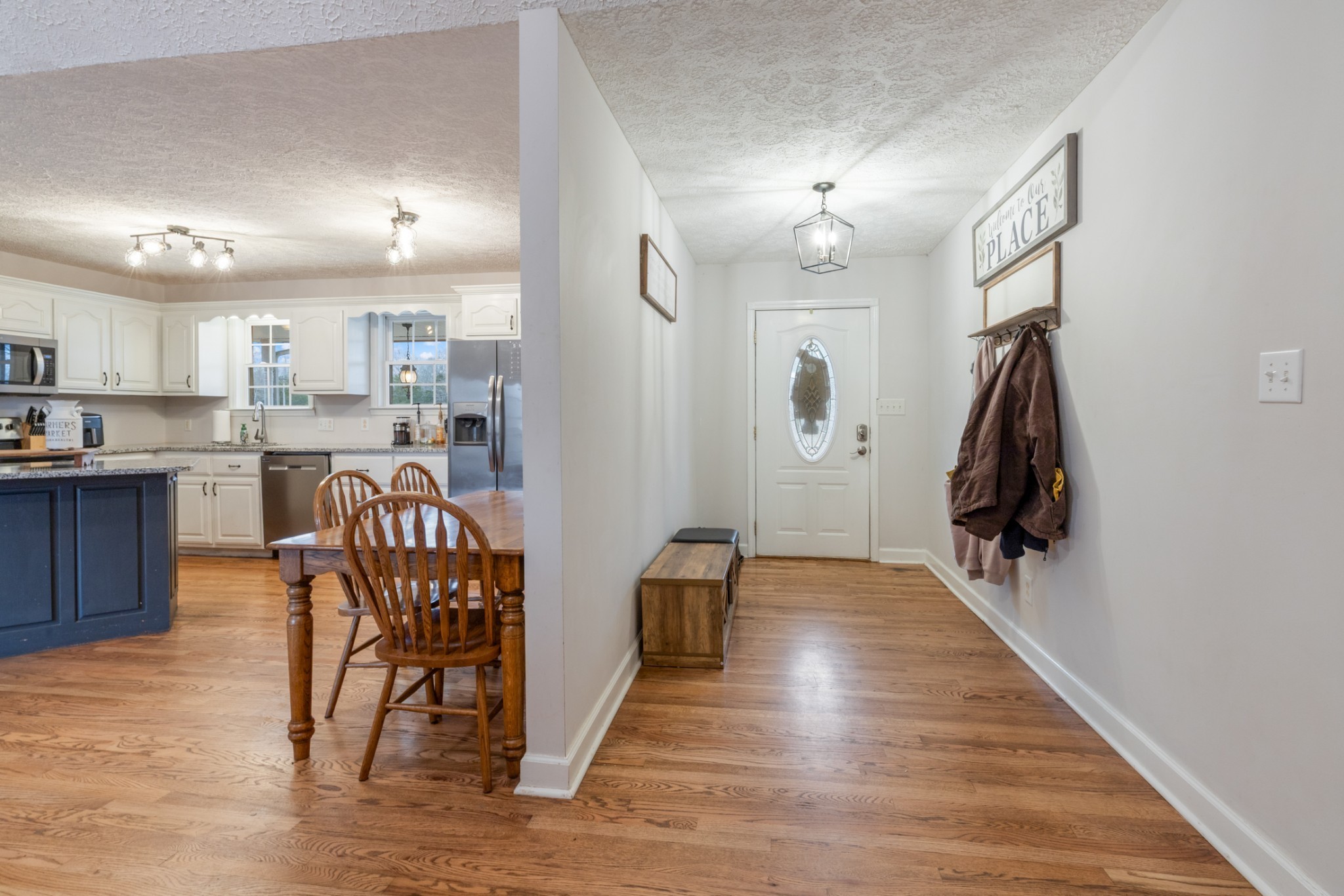 2323 Nubbin Ridge Road Dickson, TN 37055 - Photo 17 of 51 a view of kitchen and dining area with chandelier