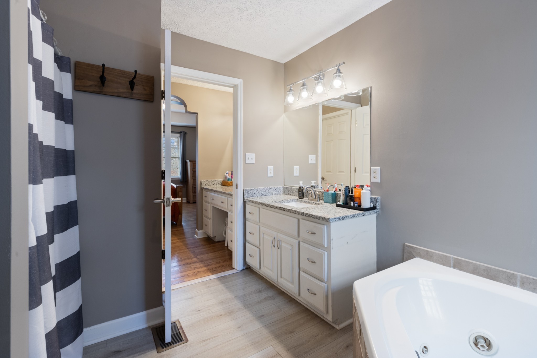 2323 Nubbin Ridge Road Dickson, TN 37055 - Photo 29 of 51 a bathroom with a sink and a mirror