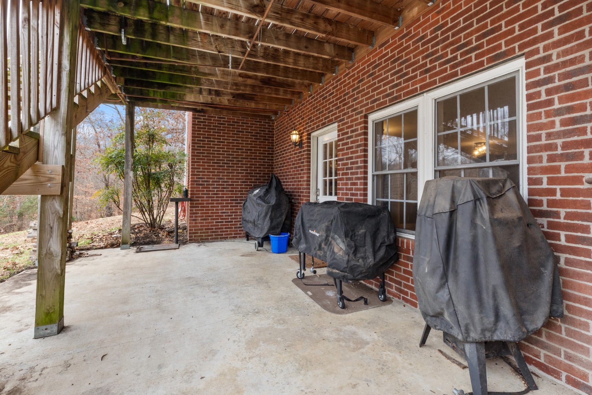2323 Nubbin Ridge Road Dickson, TN 37055 - Photo 48 of 51 a view of a room with furniture and floor to ceiling window