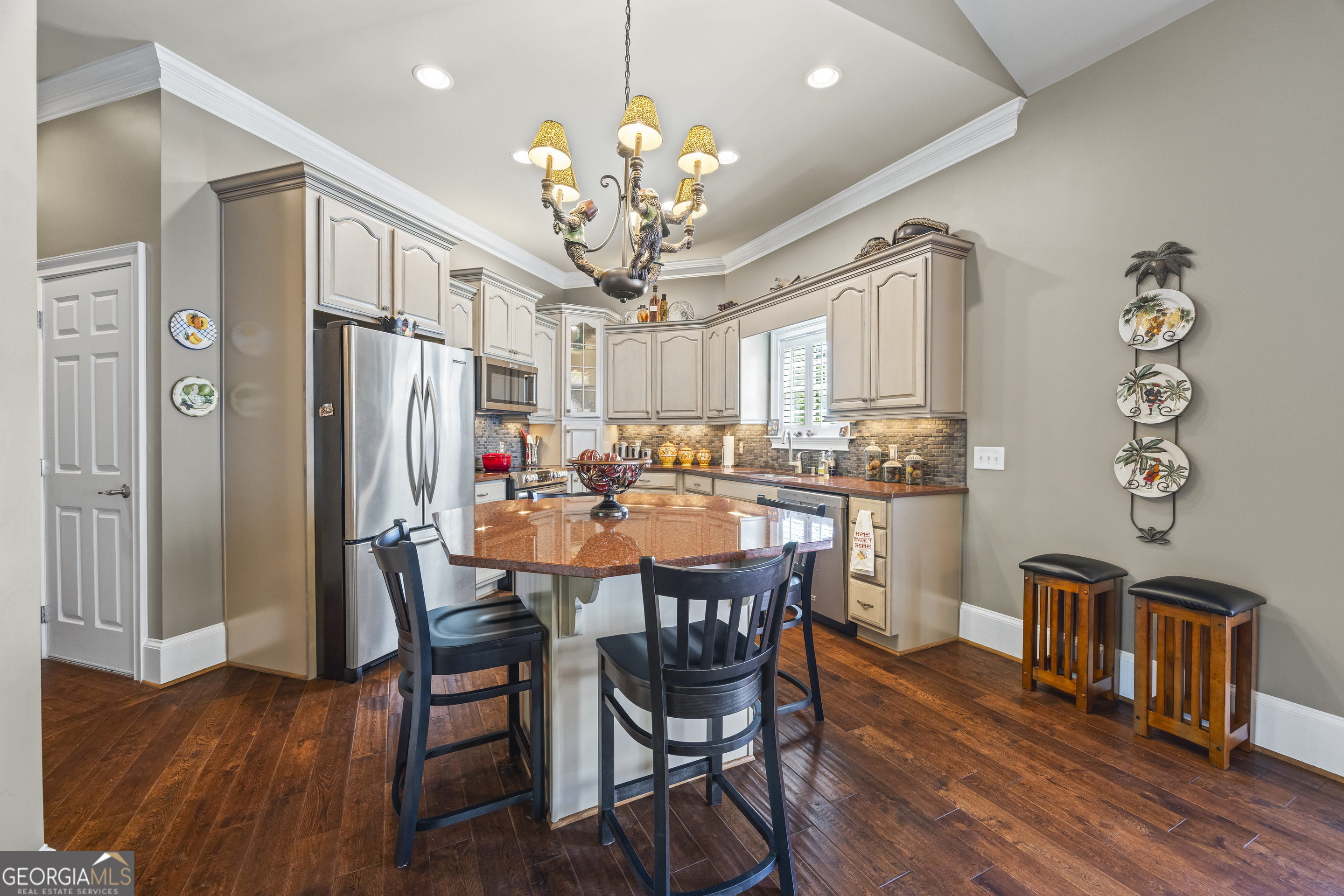 160 Evans Road Bogart, GA 30622 - Photo 101 of 157 a dining room filled chandelier and wooden floor