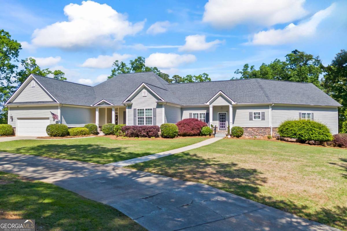 160 Evans Road Bogart, GA 30622 - Photo 14 of 157 a front view of a house with a yard