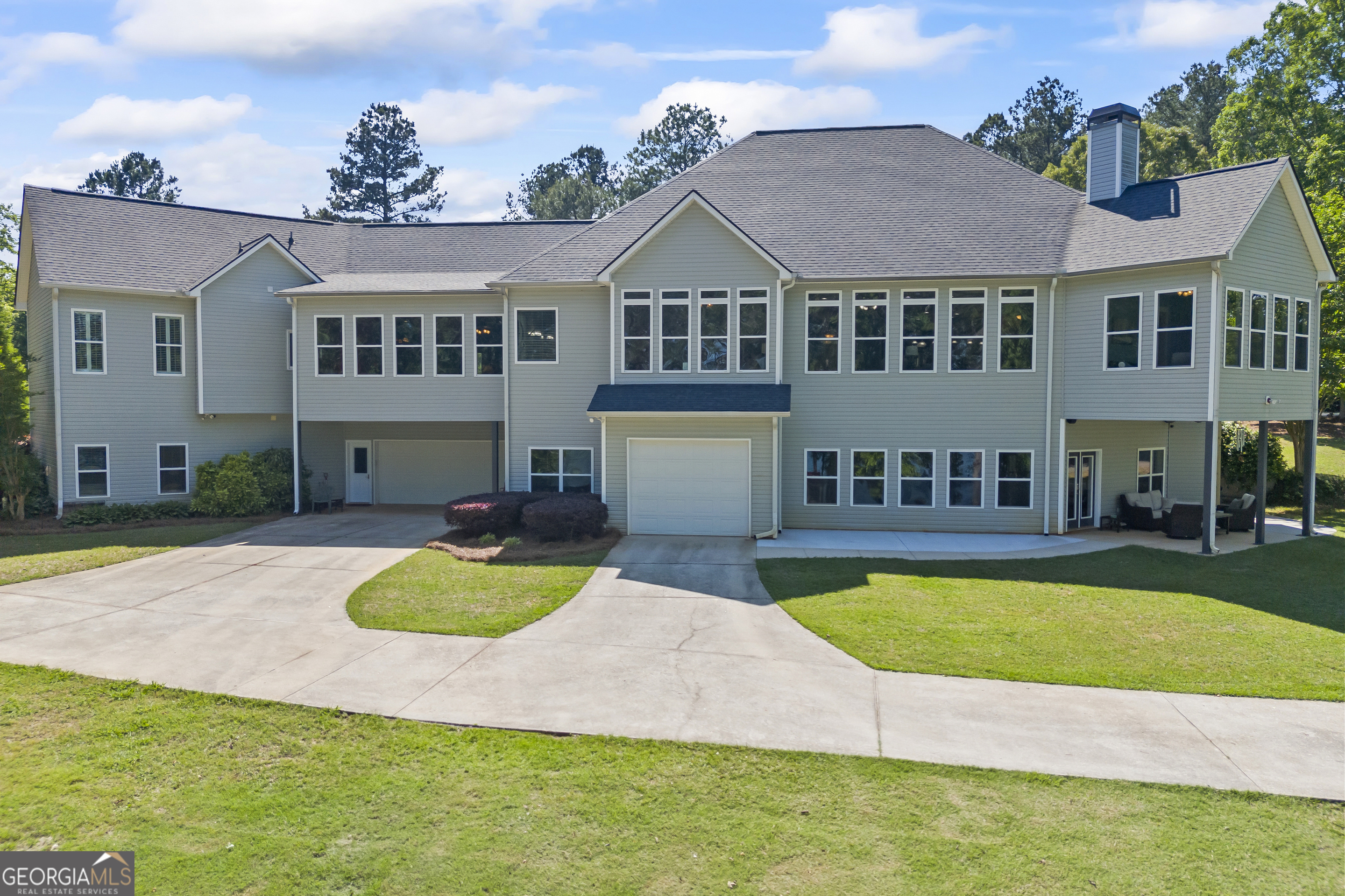160 Evans Road Bogart, GA 30622 - Photo 150 of 157 a view of a house with swimming pool and a yard