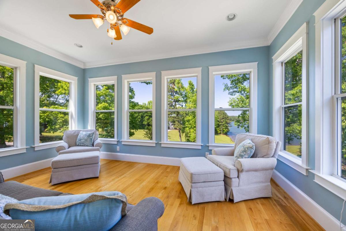 160 Evans Road Bogart, GA 30622 - Photo 32 of 157 a living room with furniture and a large window