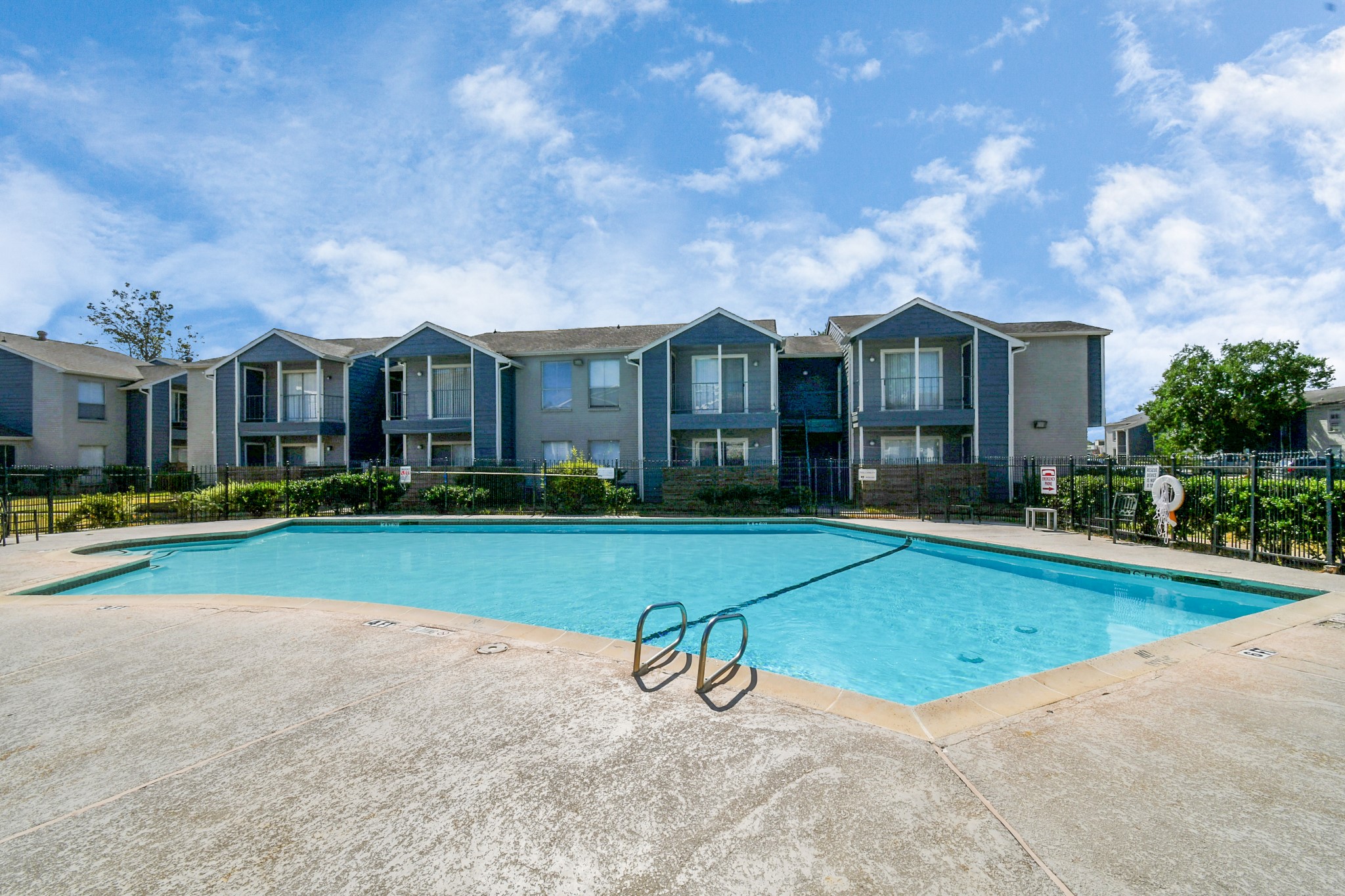 12211 Fondren Road, Unit 1112 Houston, TX 77035 - Photo 27 of 30 a view of a house with a patio and a yard