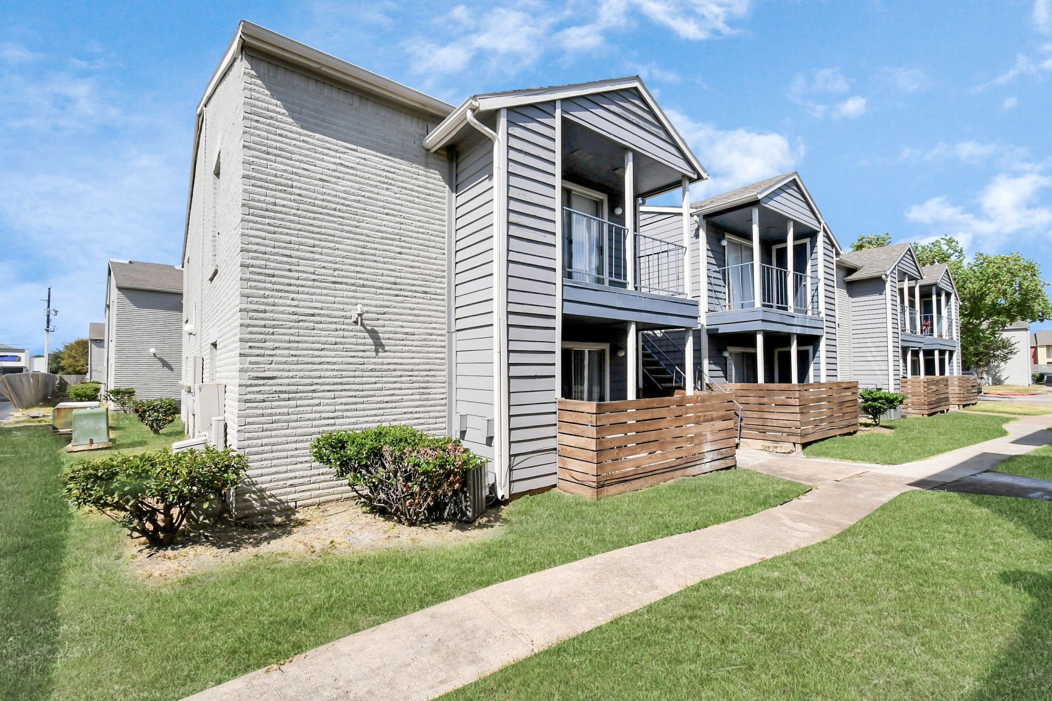 12211 Fondren Road, Unit 1112 Houston, TX 77035 - Photo 29 of 30 a front view of a house with a yard