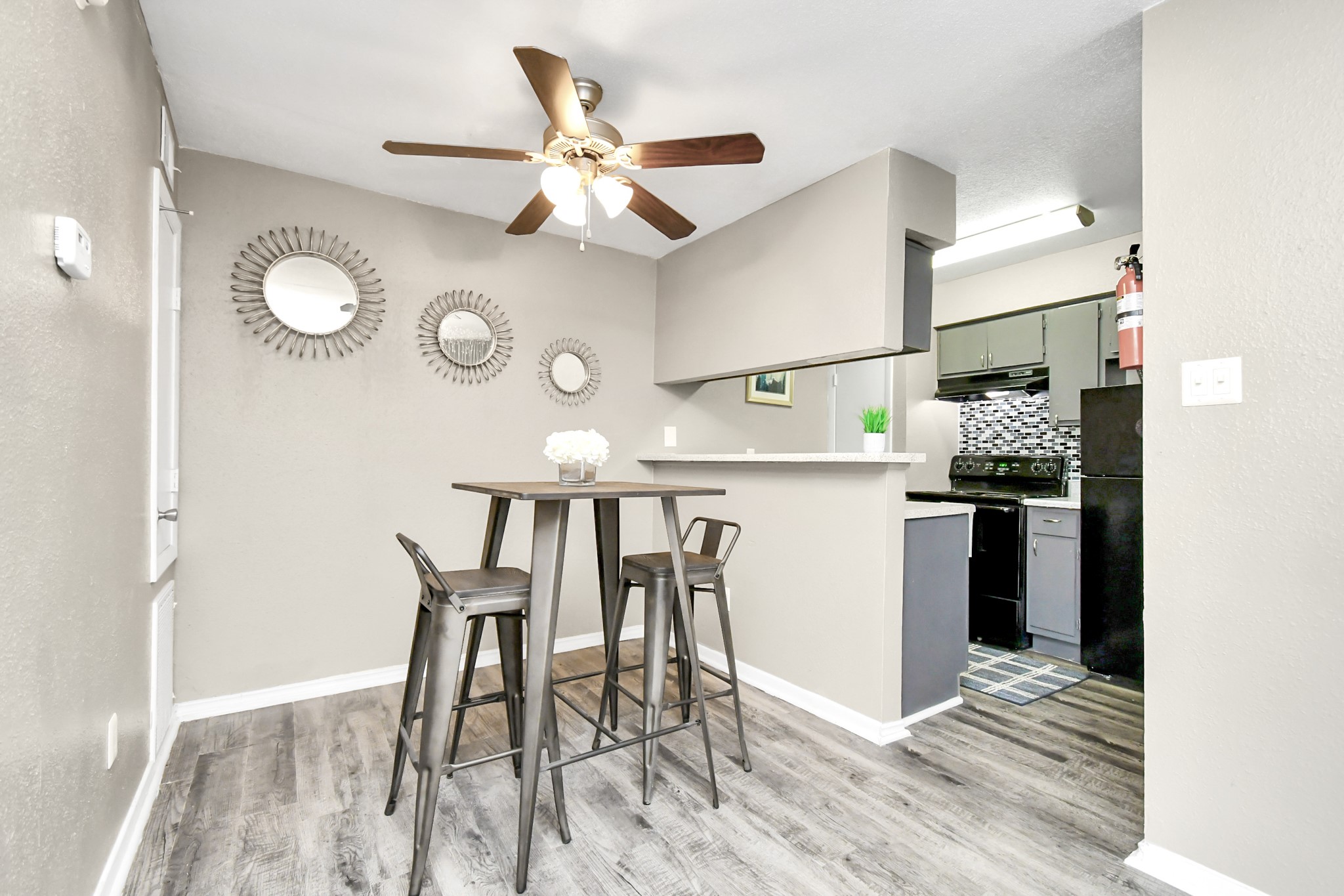 12211 Fondren Road, Unit 1112 Houston, TX 77035 - Photo 7 of 30 a view of dining table chairs and wooden floor