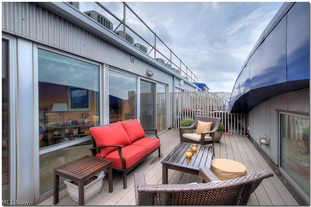 1237 Washington Avenue, Unit 1209 Cleveland, OH 44113 - Photo 17 of 33 Walk onto your private terrace with cust window designed to veiw the river & lake while lounging.