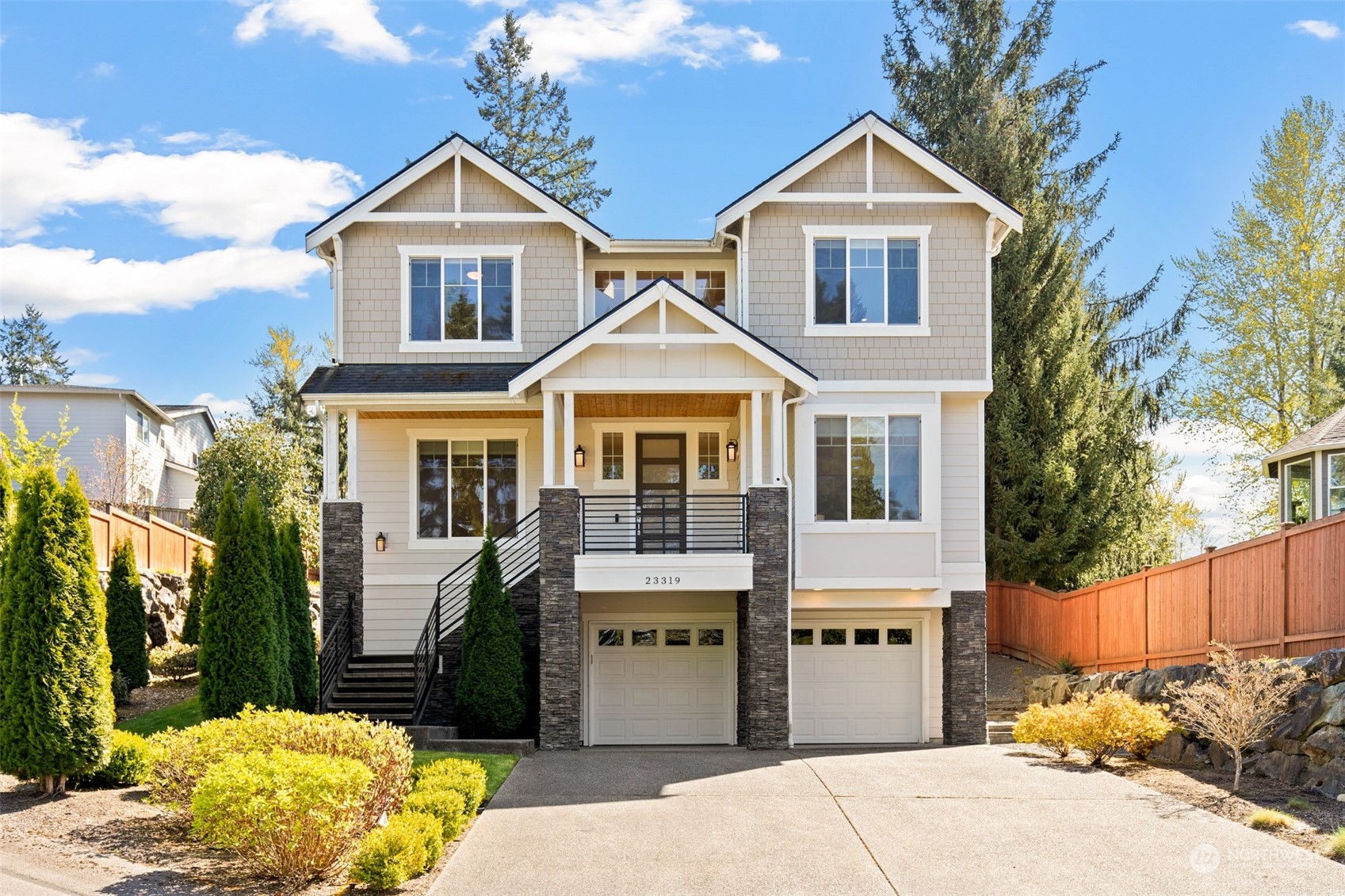 23319 15th Avenue Southeast Bothell, WA 98021 - Photo 2 of 40 a front view of a house with a yard