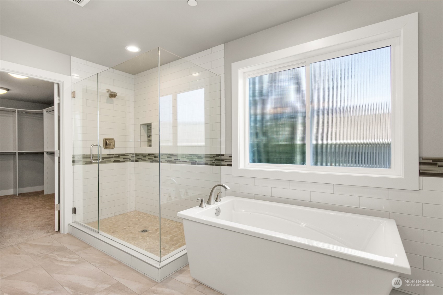 23319 15th Avenue Southeast Bothell, WA 98021 - Photo 23 of 40 a bathroom with a bathtub and a shower