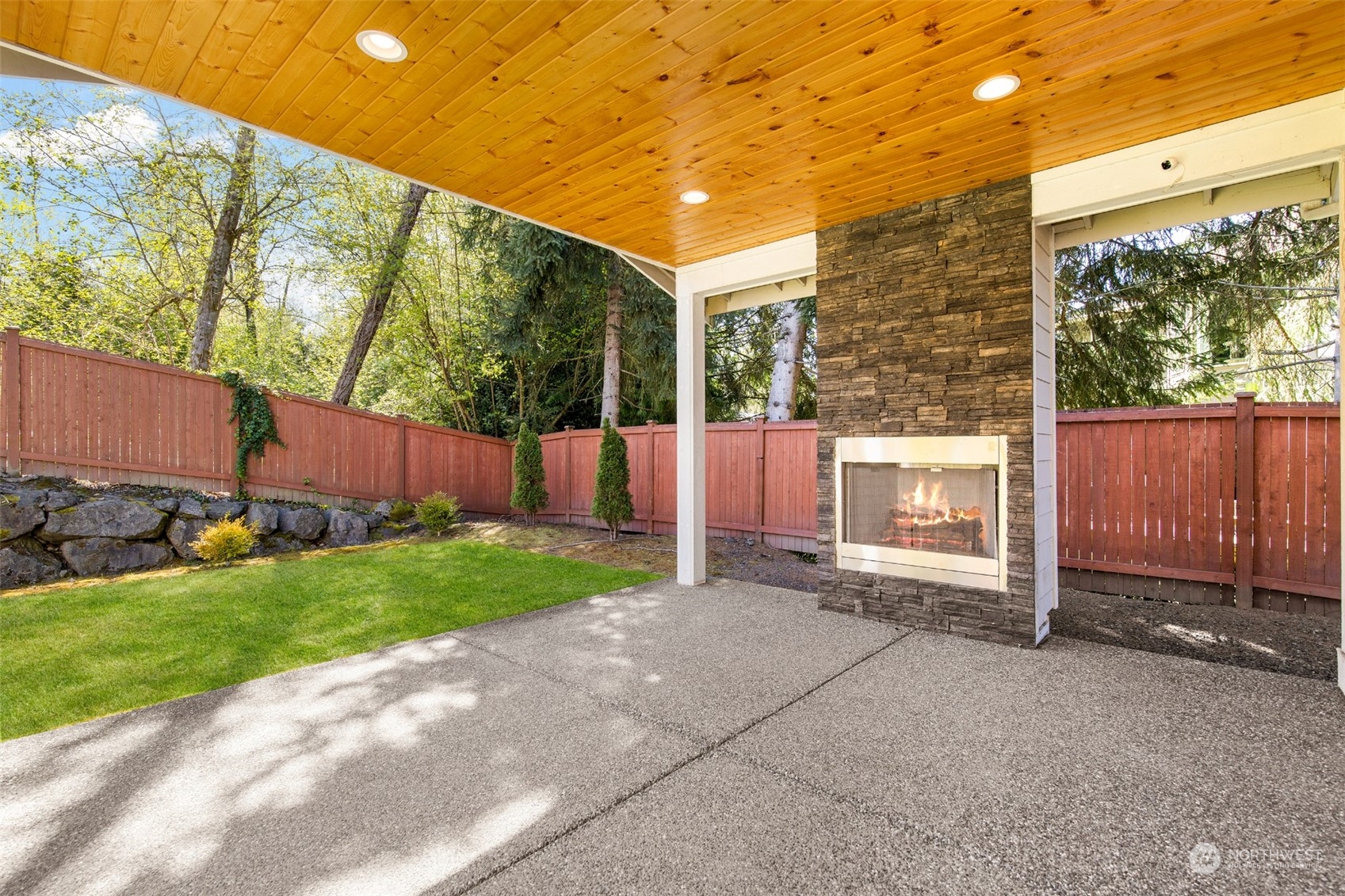 23319 15th Avenue Southeast Bothell, WA 98021 - Photo 34 of 40 a view of backyard with large tree and wooden fence