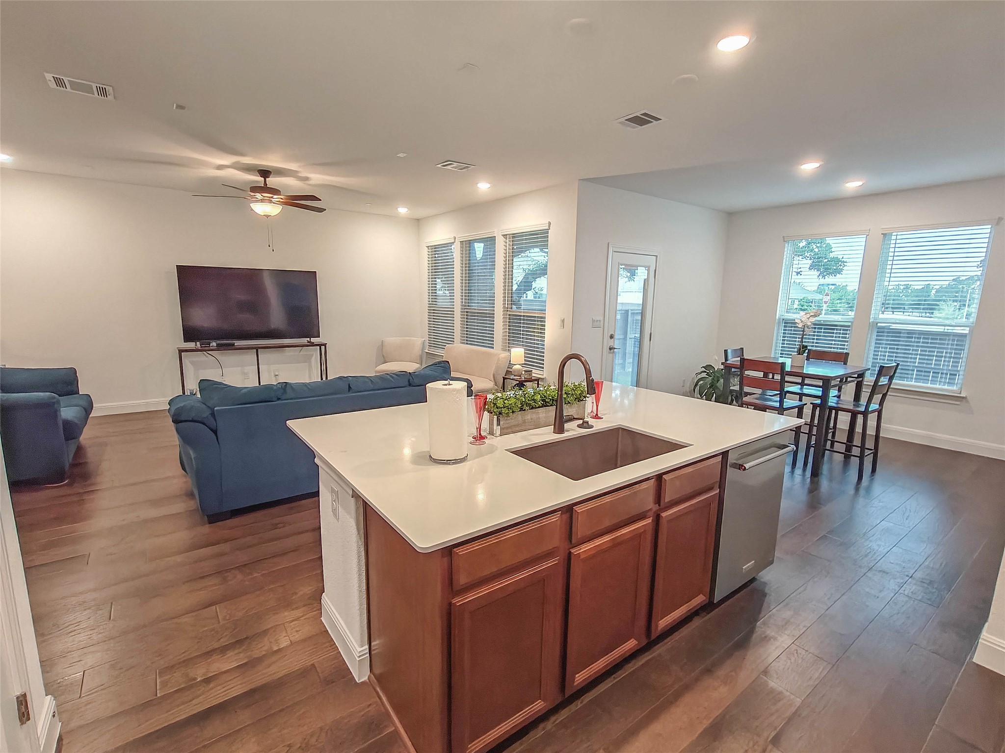 200 Fiddleneck Road Marble Falls, TX 78654 - Photo 10 of 37 a large white kitchen with a large island in the center
