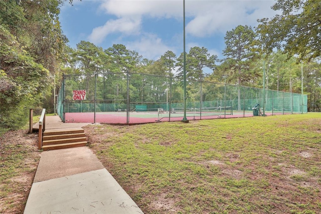 31 Green Tree Drive Coldspring, TX 77331 - Photo 2 of 7 a view of a park with large trees