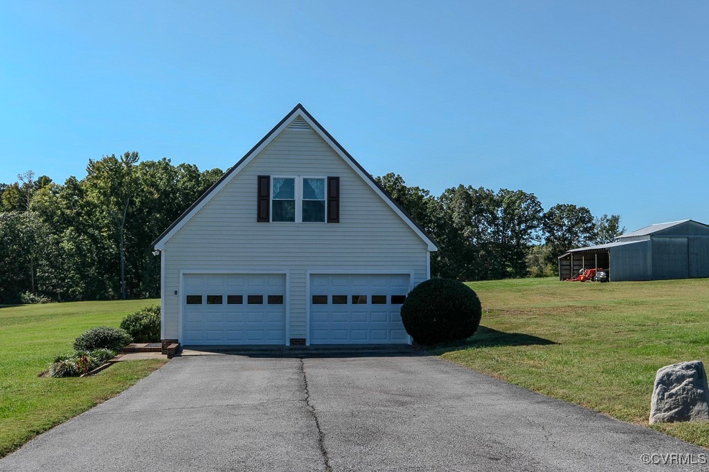 1893 Gallion Town Road Victoria, VA 23974 - Photo 2 of 41 View of property exterior featuring an outbuilding
