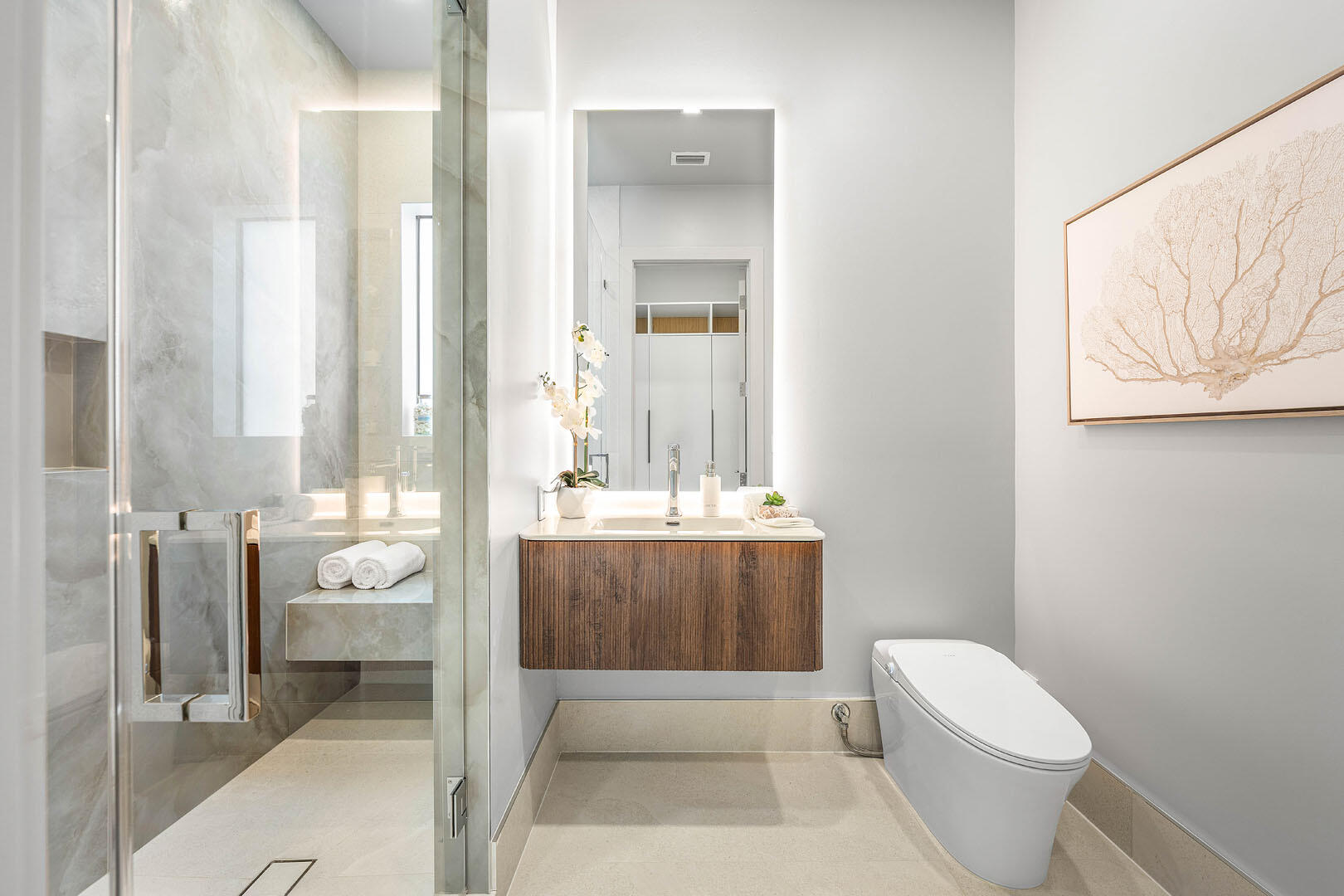 2240 Date Palm Road Boca Raton, FL 33432 - Photo 69 of 89 a bathroom with a toilet sink and mirror