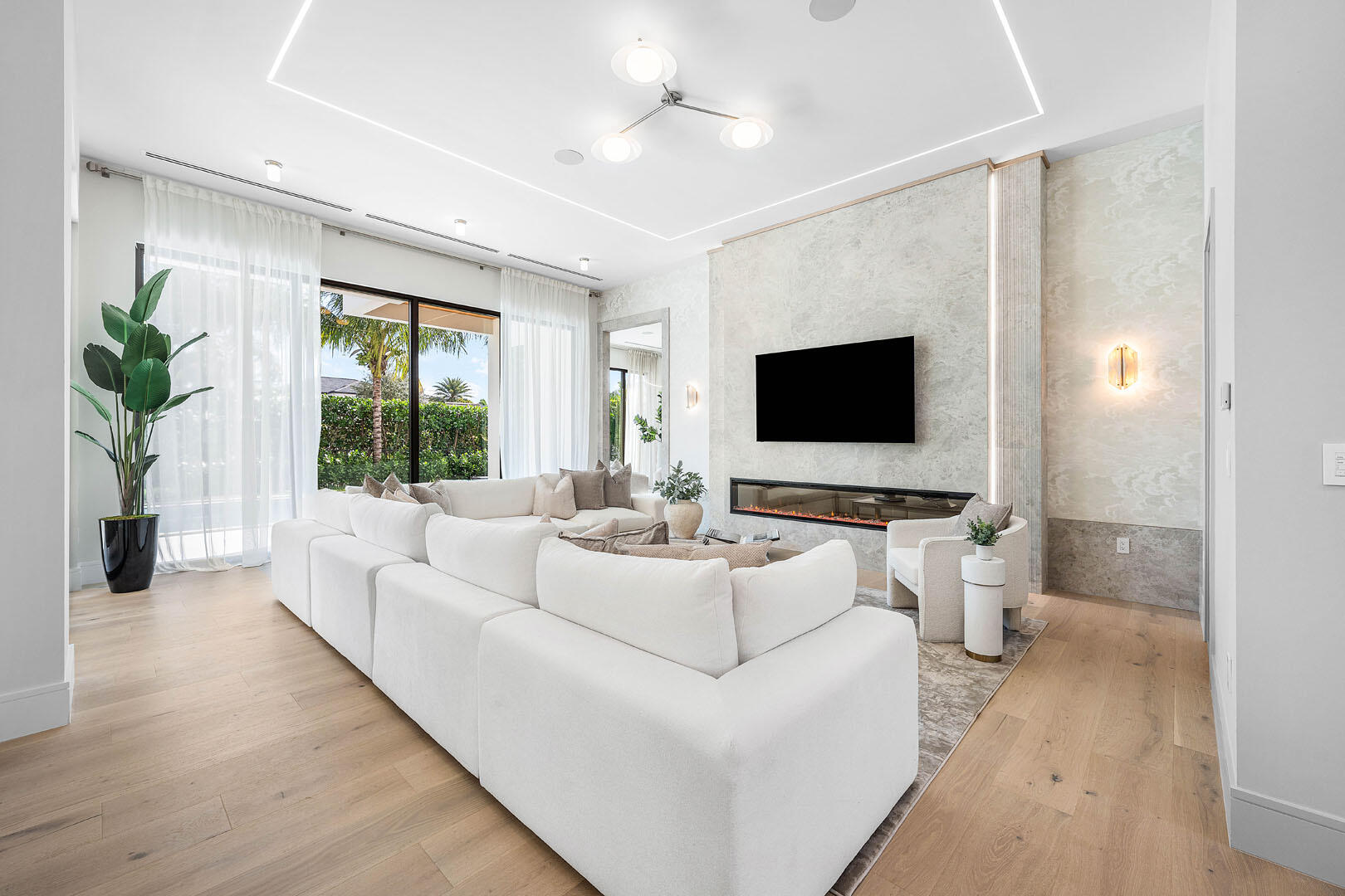 2240 Date Palm Road Boca Raton, FL 33432 - Photo 10 of 89 a living room with furniture and a flat screen tv