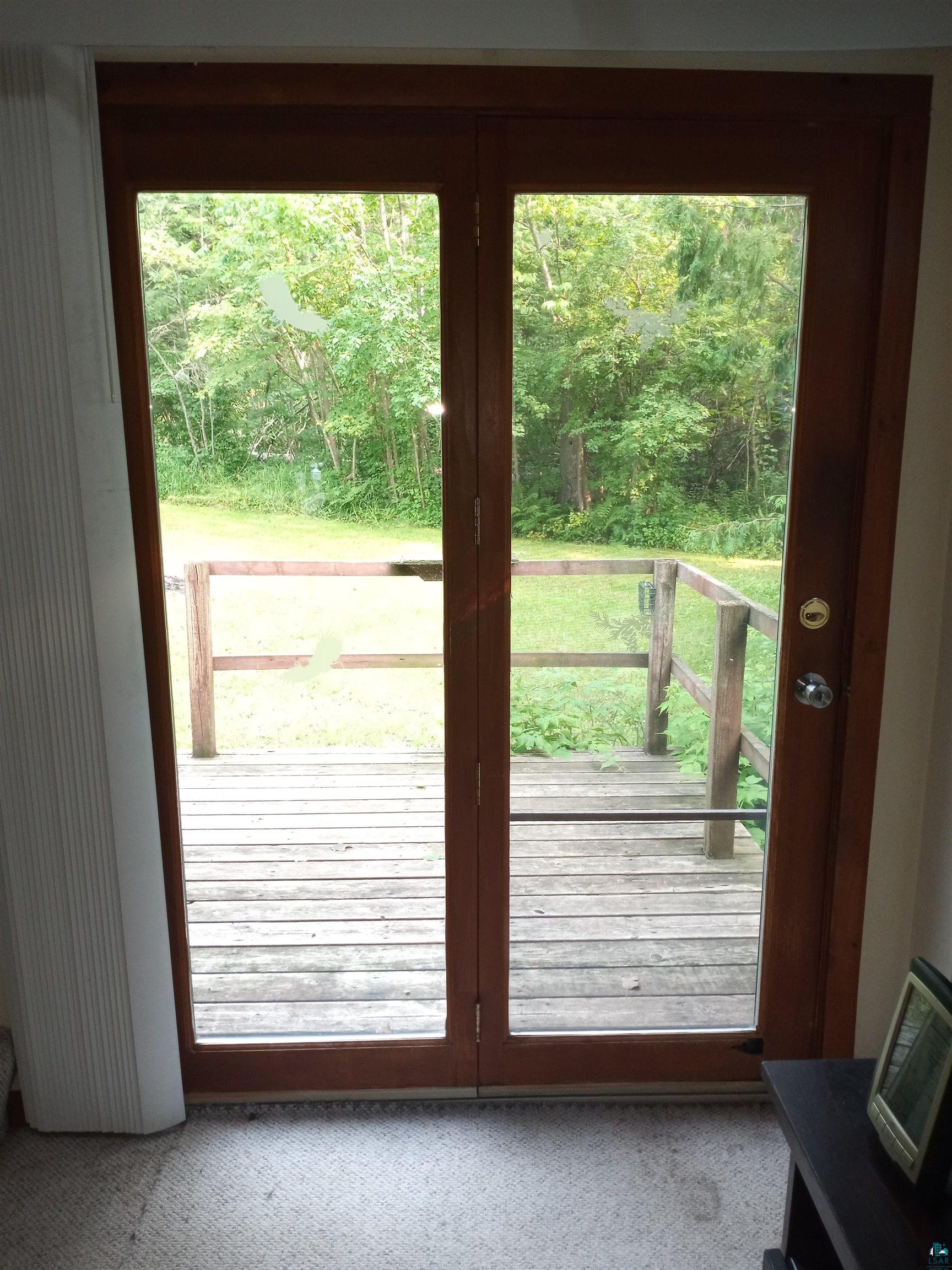 22715 Elm Street Cornucopia, WI 54827 - Photo 11 of 23 Deck off livingroom