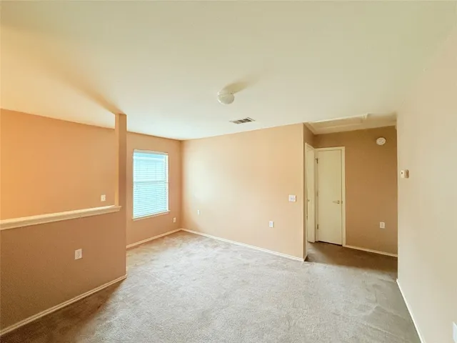 a view of a yard with a street view