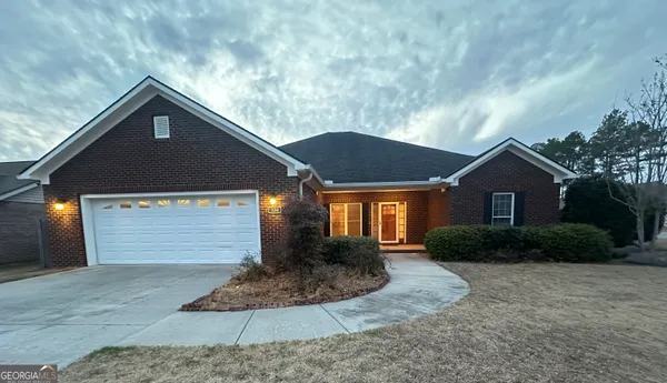 a front view of house with yard