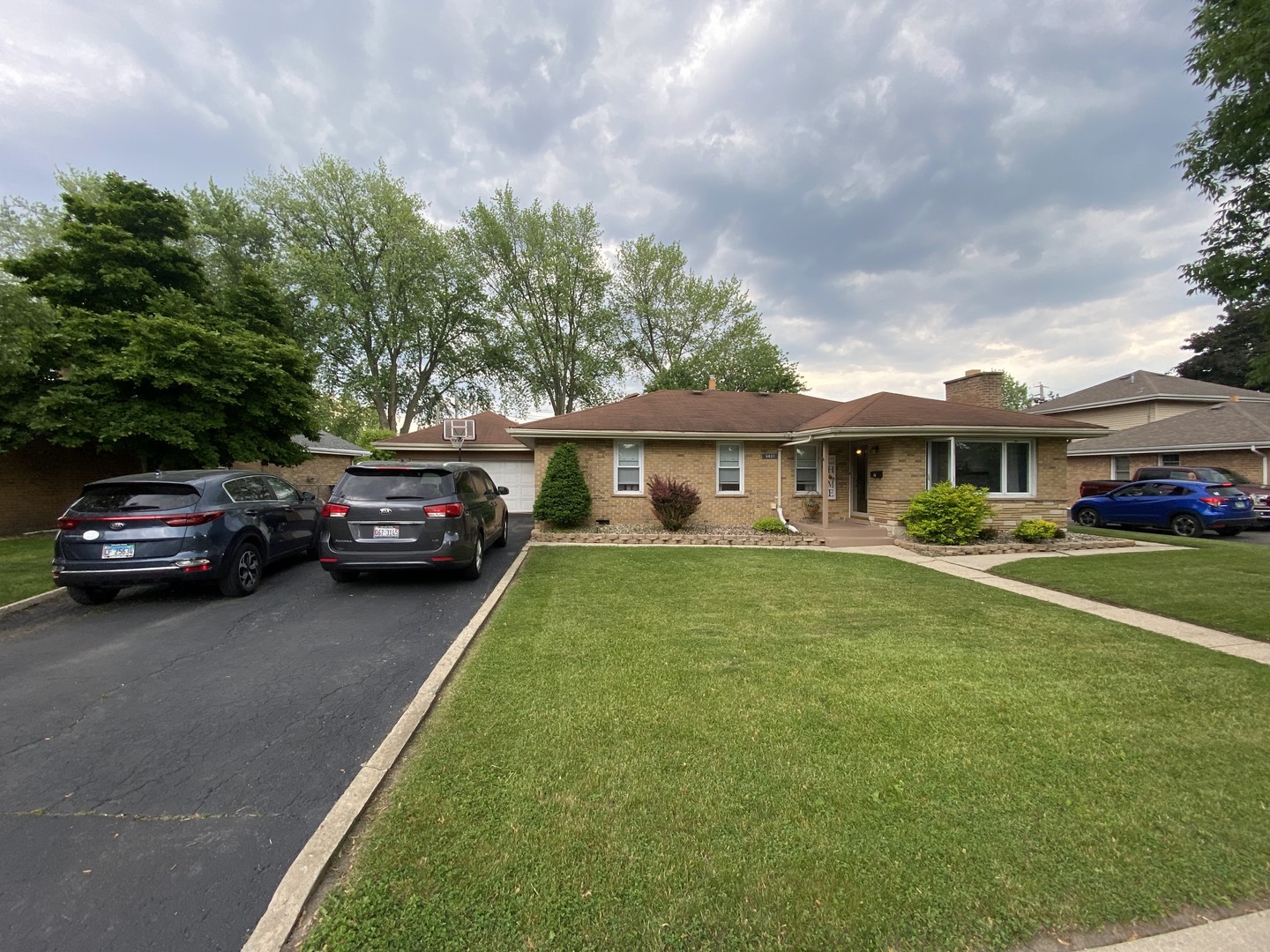 5831 109th Place Chicago Ridge, IL 60415 - Photo 1 of 19 a view of a yard in front of house