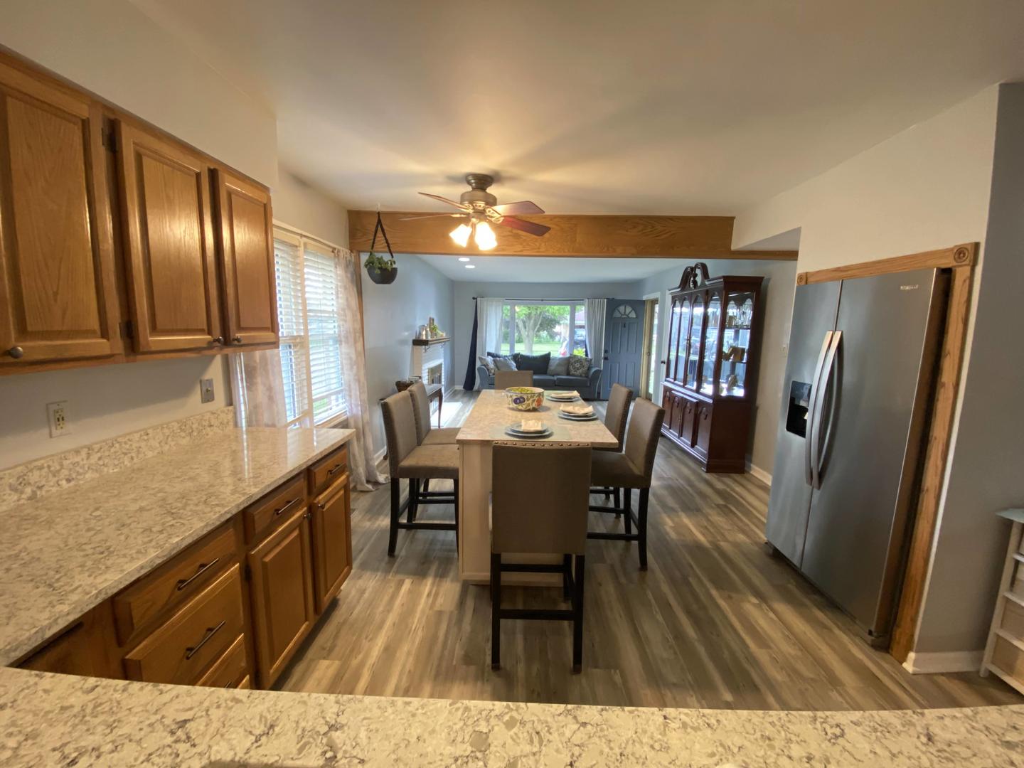 5831 109th Place Chicago Ridge, IL 60415 - Photo 3 of 19 a view of a dining room with furniture and wooden floor
