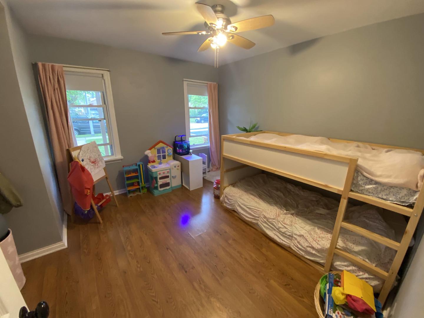 5831 109th Place Chicago Ridge, IL 60415 - Photo 9 of 19 a living room with furniture and a wooden floor