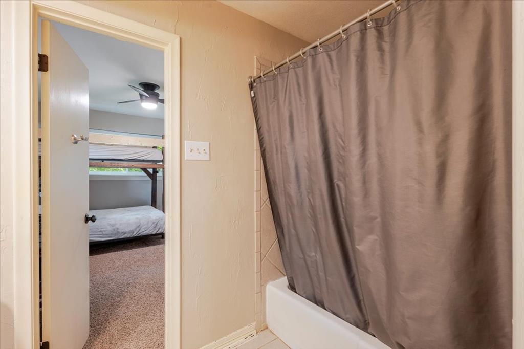 1507 Greenbrier Drive Sherman, TX 75092 - Photo 12 of 27 a en suite bathroom with a sink and toilet