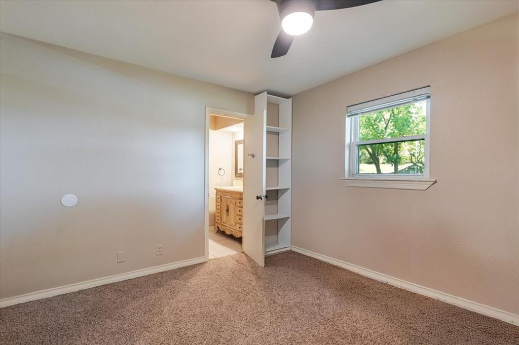 1507 Greenbrier Drive Sherman, TX 75092 - Photo 17 of 27 an empty room with windows