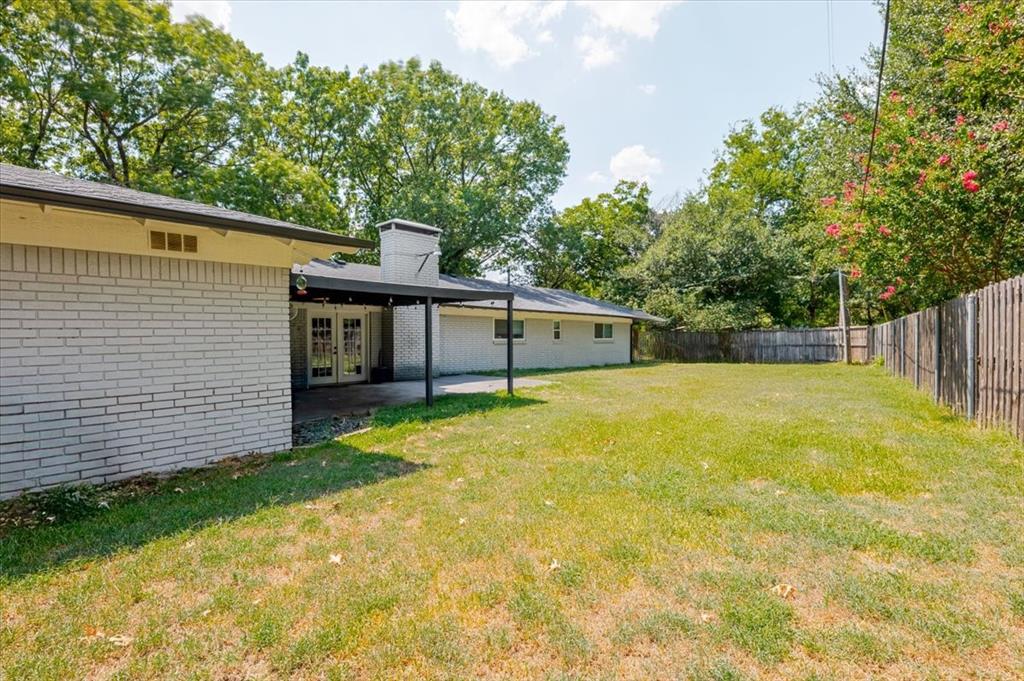1507 Greenbrier Drive Sherman, TX 75092 - Photo 26 of 27 a front view of house with yard and green space