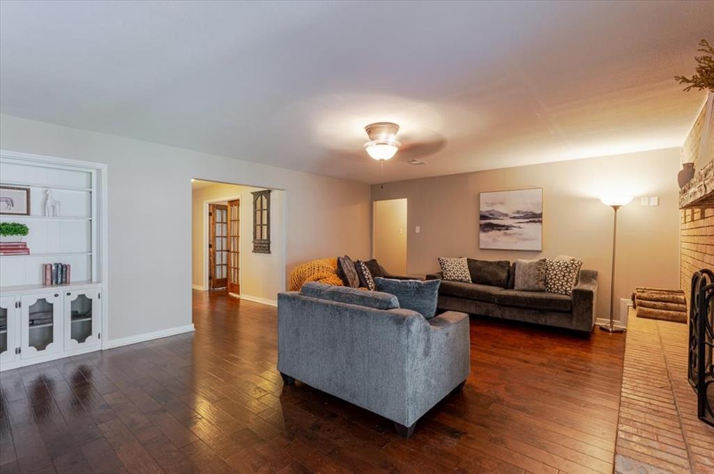 1507 Greenbrier Drive Sherman, TX 75092 - Photo 8 of 27 a living room with furniture and wooden floor