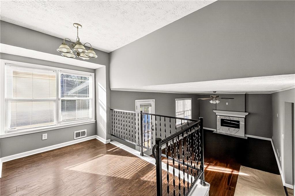 1075 Forest Heights Road Stone Mountain, GA 30083 - Photo 17 of 42 a view of livingroom with furniture and windows