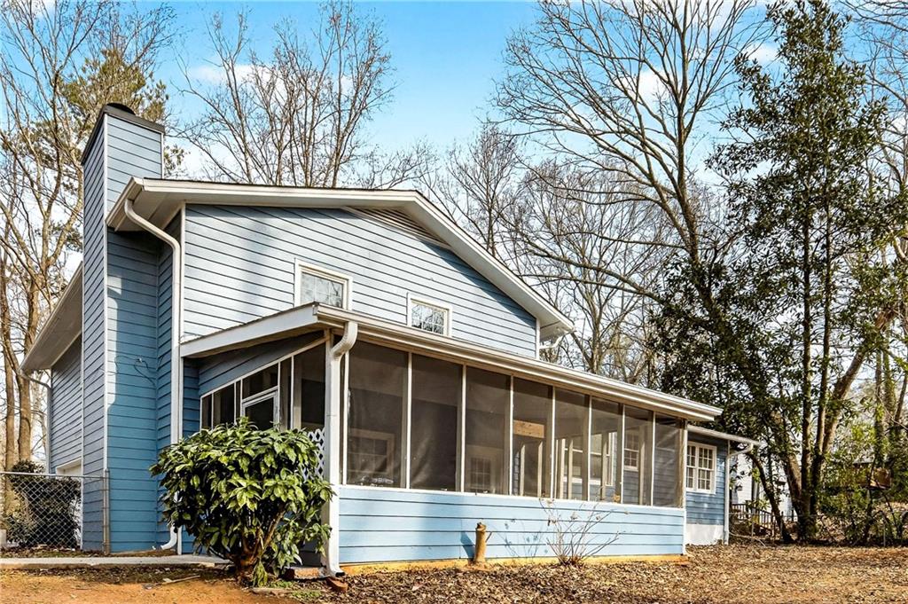 1075 Forest Heights Road Stone Mountain, GA 30083 - Photo 38 of 42 a view of house with a tree in front