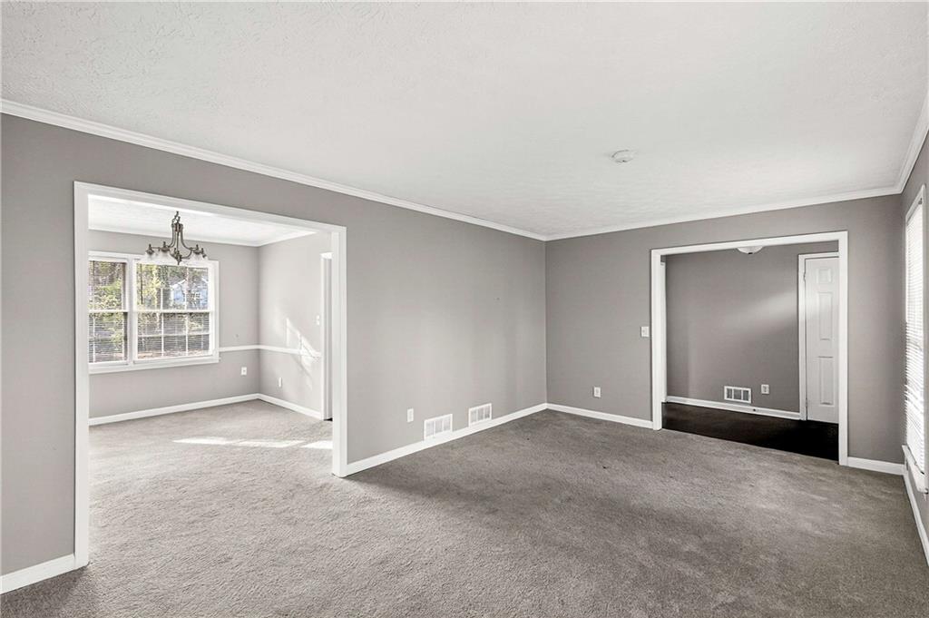 1075 Forest Heights Road Stone Mountain, GA 30083 - Photo 10 of 42 a view of an empty room with a window