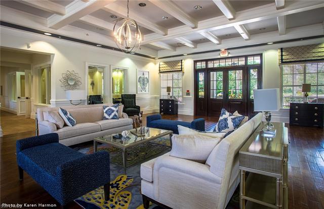 3974 East Hampton Circle Fort Myers, FL 33905 - Photo 35 of 36 a living room with furniture and a chandelier